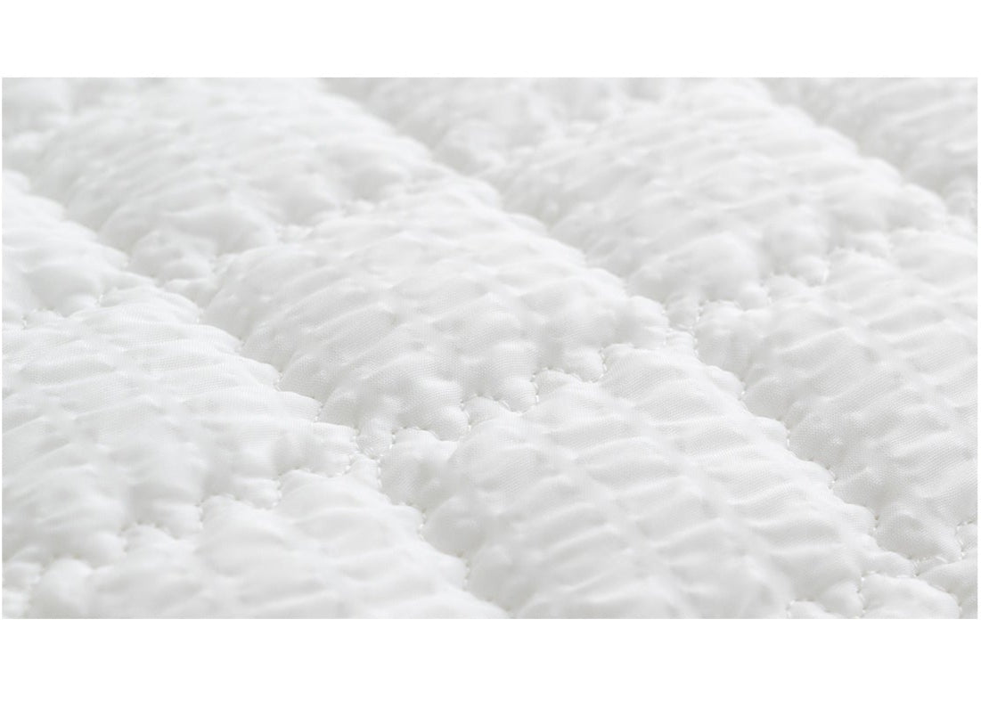 Close-up of breathable seersucker cotton texture showing cooling surface